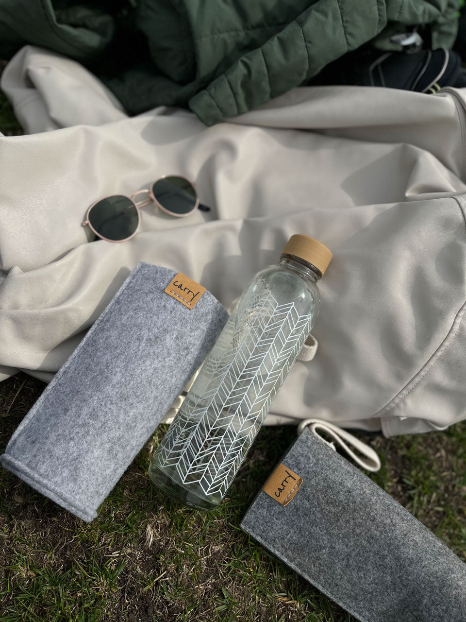 Carrybottles_Schutzhülle_für_Glasflaschen_für unterwegs_Sleeve